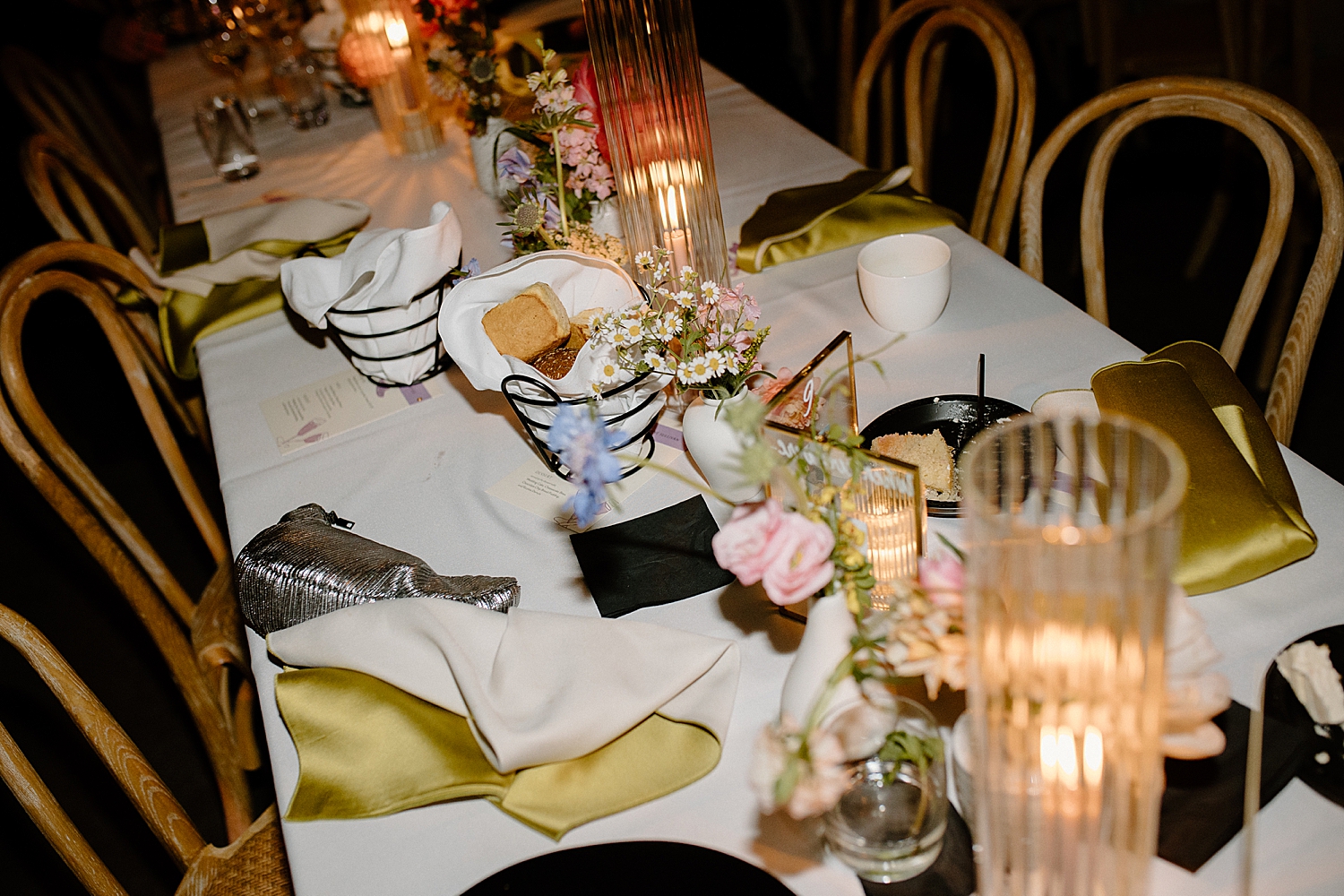 guests leave napkins and plates on table at reception by Chicago wedding photographer